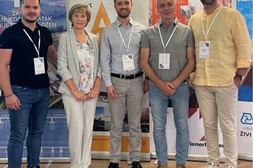 Bojan Poletanovic and four other persons in front of company displays